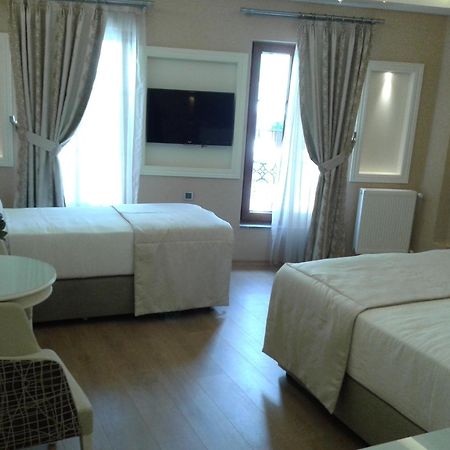 Rooms Inn Taxim Стамбул Номер фото