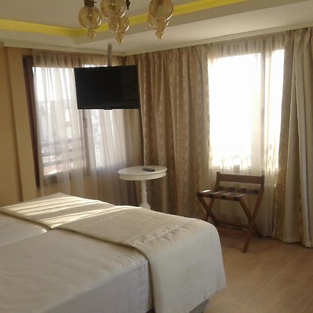 Rooms Inn Taxim Стамбул Номер фото
